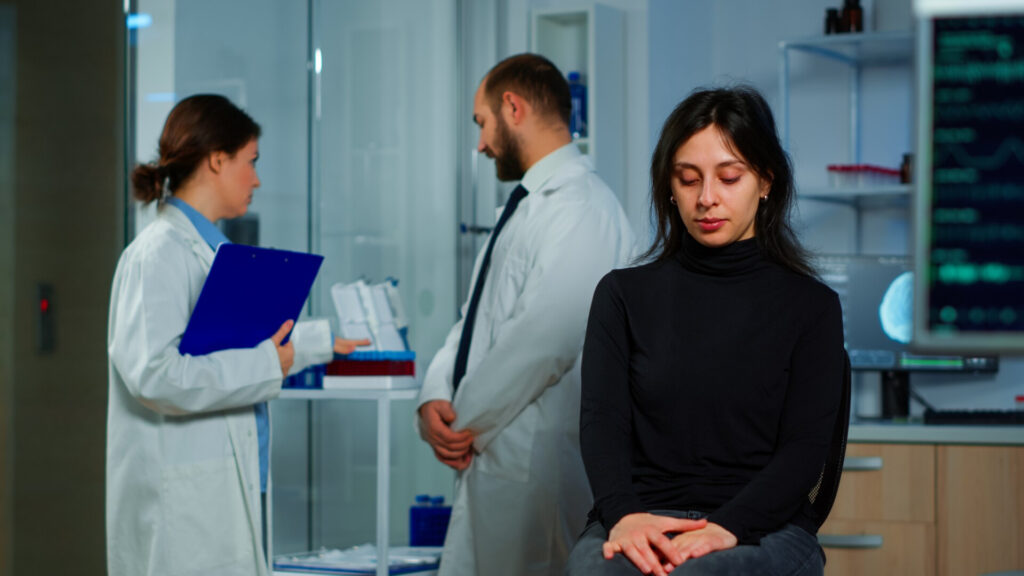 Wolf Law are the number one accident solicitors in Liverpool and the Wirral, supporting claims for personal injury claims in Liverpool Wolf Law are the number one accident solicitors in Liverpool and the Wirral, supporting claims for personal injury claims in Liverpool Young woman in a black turtleneck sits with hands in her lap, while two scientists in white coats converse in a modern laboratory behind her.