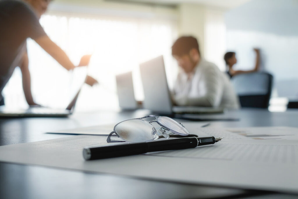 Wolf Law - The Top Accident Solicitors In Liverpool Wolf Law Wolf Law - The Top Accident Solicitors In Liverpool Wolf Law 537 Wolf Law are the number one accident solicitors in Liverpool and the Wirral, supporting claims for personal injury claims in Liverpool Wolf Law are the number one accident solicitors in Liverpool and the Wirral, supporting claims for personal injury claims in Liverpool Glasses and a pen on papers in the foreground with coworkers at laptops in a bright, blurred office background.