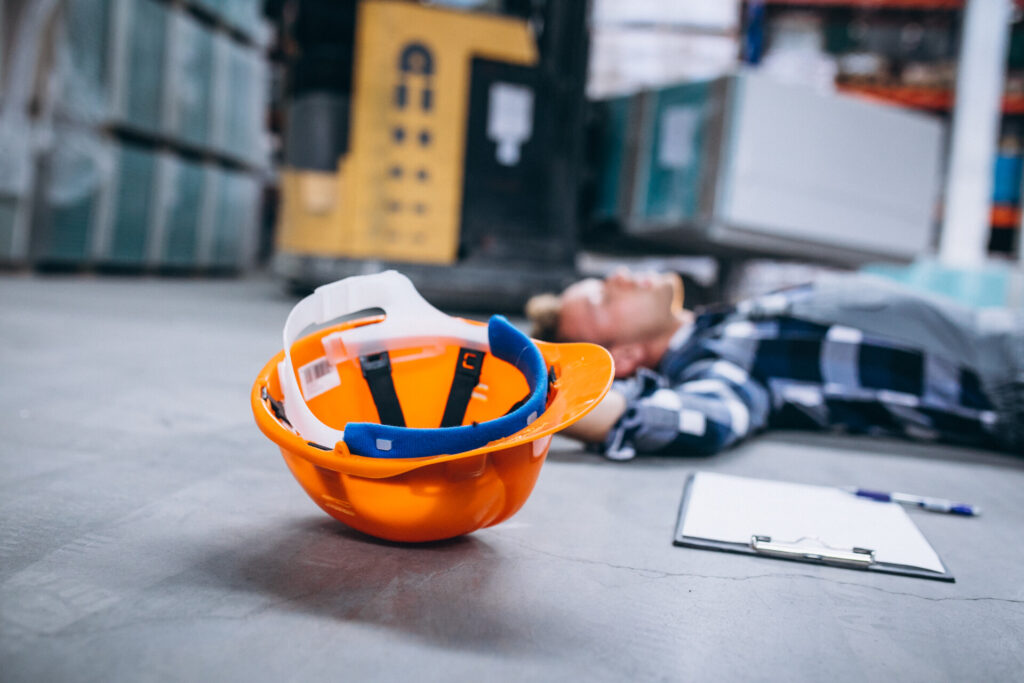 workplace accident injury worker safety hard hat