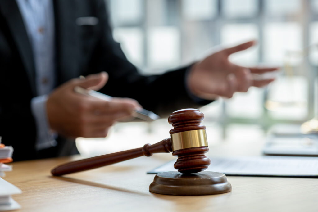 Wolf Law - The Top Accident Solicitors In Liverpool Wolf Law Wolf Law - The Top Accident Solicitors In Liverpool Wolf Law The judges hammer is placed on the table the lawyer concept as Wolf Law are the number one accident solicitors in Liverpool and the Wirral, supporting claims for personal injury claims in Liverpool Wolf Law are the number one accident solicitors in Liverpool and the Wirral, supporting claims for personal injury claims in Liverpool Judge's gavel resting on a wooden desk with a blurred figure in a suit in the background, suggesting a courtroom or legal setting.