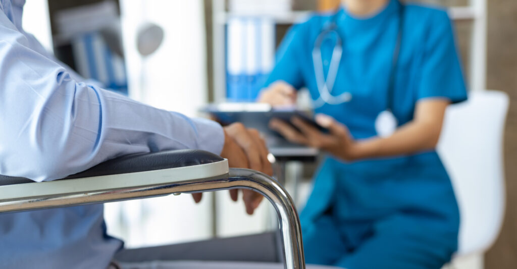 Wolf Law - The Top Accident Solicitors In Liverpool Wolf Law Wolf Law - The Top Accident Solicitors In Liverpool Wolf Law Man with a leg injury in a wheelchair sees a doctor in a hospital for a check-up Female doctor examining a wheelchair patient in an examination room at a hospital Wolf Law are the number one accident solicitors in Liverpool and the Wirral, supporting claims for personal injury claims in Liverpool Wolf Law are the number one accident solicitors in Liverpool and the Wirral, supporting claims for personal injury claims in Liverpool Patient's arm rests on a hospital bed rail while a clinician in blue scrubs sits nearby with a clipboard in a clinical setting.