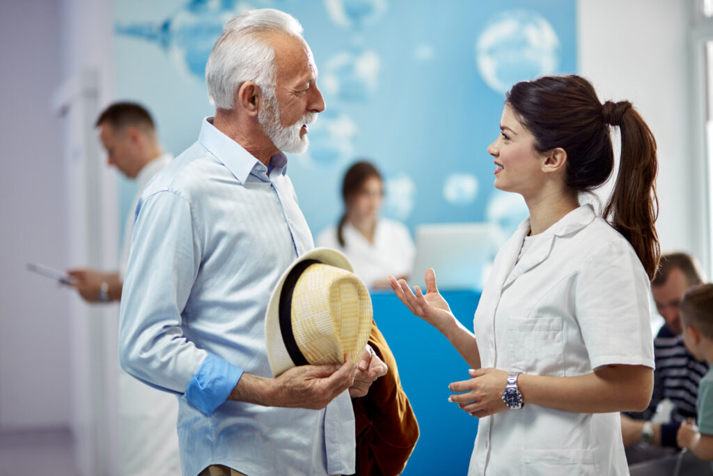 Wolf Law are the number one accident solicitors in Liverpool and the Wirral, supporting claims for personal injury claims in Liverpool Wolf Law are the number one accident solicitors in Liverpool and the Wirral, supporting claims for personal injury claims in Liverpool Female clinician in a white coat speaks with an elderly man in a light-blue shirt, who is holding a hat and coat in a bright clinic hallway.